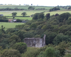 Okehampton Castle seen from the Meldon train